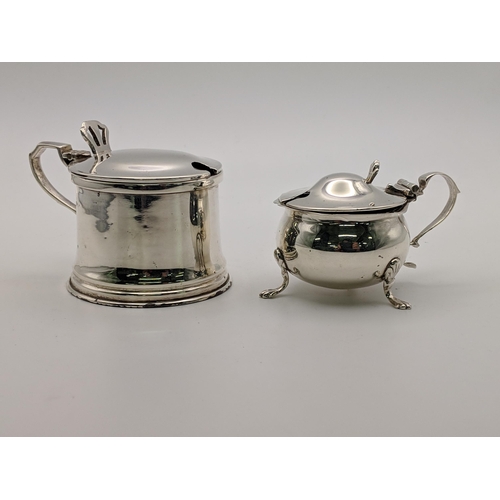 125 - A pair of silver salts with blue glass liners, silver weight 103.8g, Location: A4M