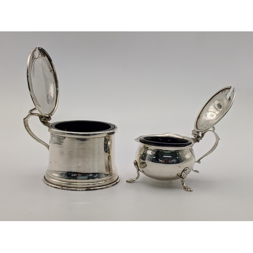 125 - A pair of silver salts with blue glass liners, silver weight 103.8g, Location: A4M