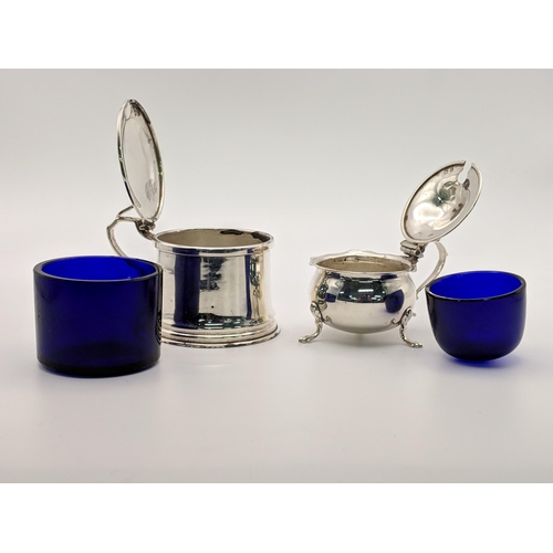 125 - A pair of silver salts with blue glass liners, silver weight 103.8g, Location: A4M