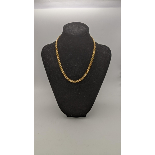 134 - A 9ct gold and white metal tri-coloured necklace 13g Location: CAB4