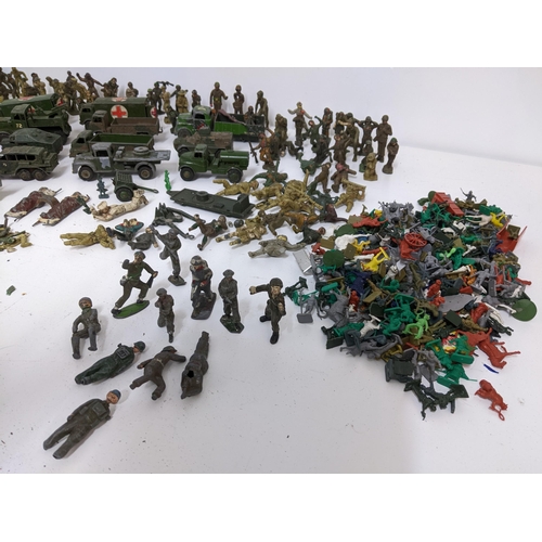 237 - Selection of military diecast model vehicles and soldiers to include Benbros, Dinky Toys, and Meccan... 