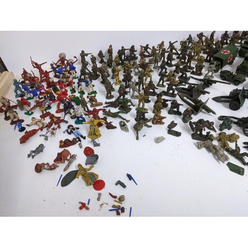 237 - Selection of military diecast model vehicles and soldiers to include Benbros, Dinky Toys, and Meccan... 