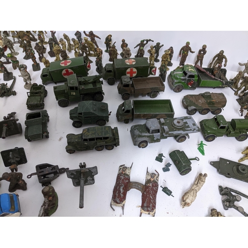 237 - Selection of military diecast model vehicles and soldiers to include Benbros, Dinky Toys, and Meccan... 