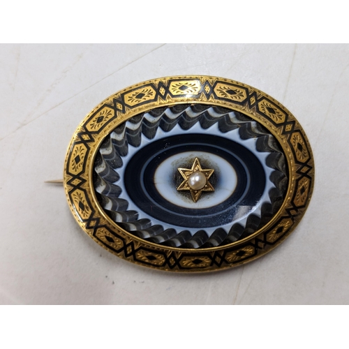 80 - A Victorian seed pearl inset mourning brooch
Location: CAB3