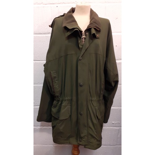 30 - Barbour-A green breathable rain jacket with detachable hood, having a green fleece collar, a green B... 
