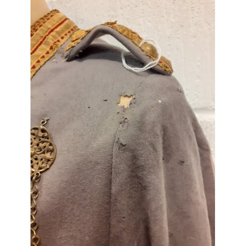 68 - An early 20th Century Russian Cossack Chokha grey cotton fitted tunic A/F with traditional Gazyrs ca... 