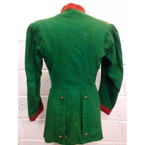 67 - An early 20th Century Russian Cossack Chokha green felt fitted tunic A/F having a traditional Gazyrs... 