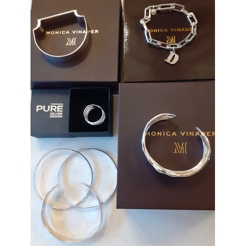 83 - A group of modern silver and silver tone jewellery to include 3 Monica Vinader silver bracelets; one... 