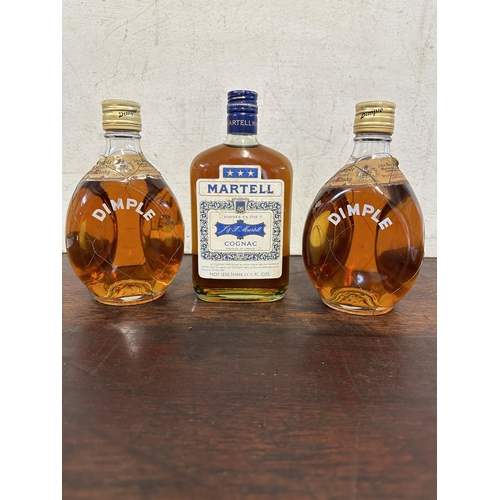 71 - A single bottle of Martell Cognac 11 ½ flo oz & 2 bottles Dimple Haig Scotch Whisky
Location:R4