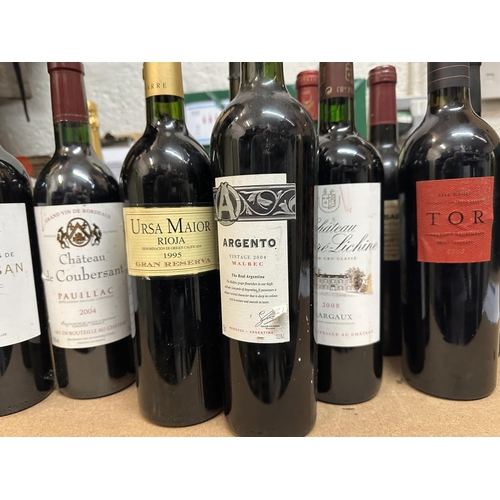 80 - 11 mixed bottles to include Malbec, Rioja, Pauillac
Location: Fire door (clear crate)