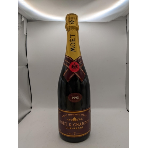 81 - A boxed bottle of Moet & Chandon 1995 vintage together with 2 glasses with stand in presentation cas... 