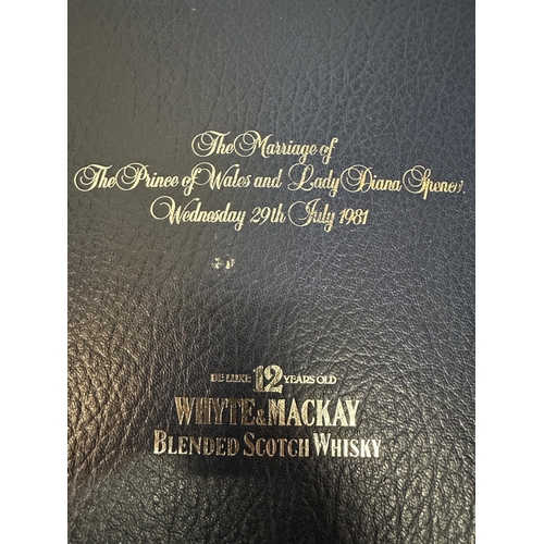 119 - A single boxed bottle of Whyte & Mackay blended Scotch Whisky De luxe 12 year old. commemorating the... 