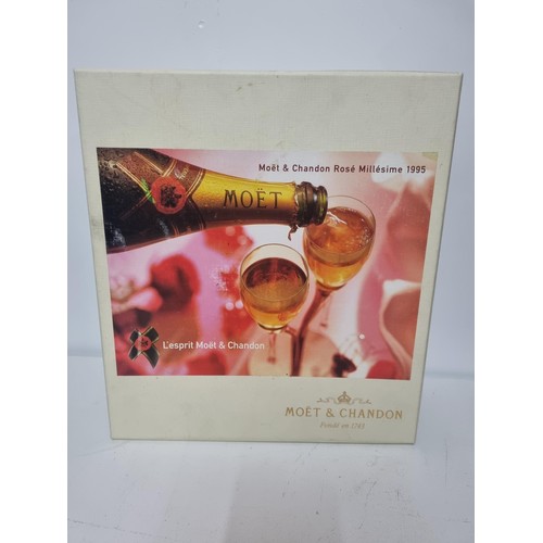 81 - A boxed bottle of Moet & Chandon 1995 vintage together with 2 glasses with stand in presentation cas... 