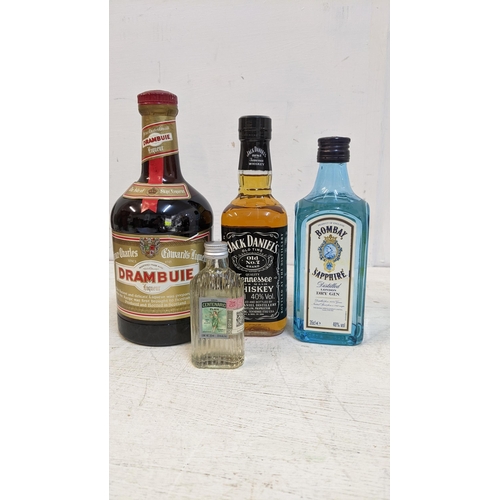 150 - A selection of miscellaneous spirits to include Bombay Sapphire dry Gin 350ml, one bottle of Jack Da... 