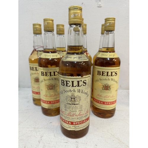 156 - Eight bottles of Bells Old Scotch Whisky, 7 x 75cl, 1 x 26 2/3 fl oz 
Location: S1.2