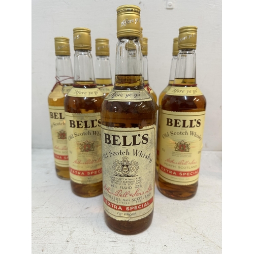 156 - Eight bottles of Bells Old Scotch Whisky, 7 x 75cl, 1 x 26 2/3 fl oz 
Location: S1.2