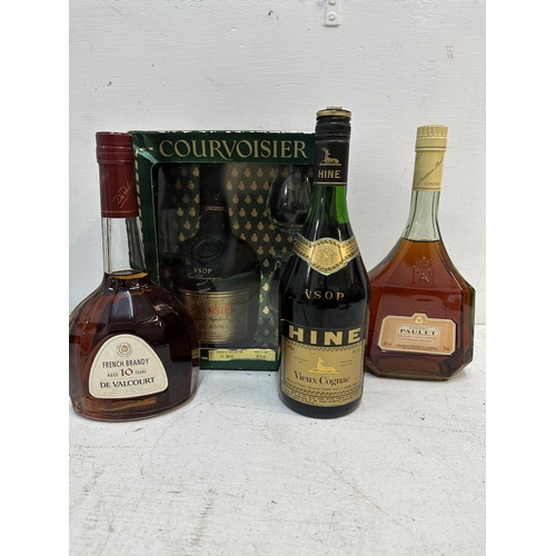 158 - Three bottles of Cognac to include Paulet, Hine Vieux, Cognac, Courvoisier and one bottle of De Valc... 