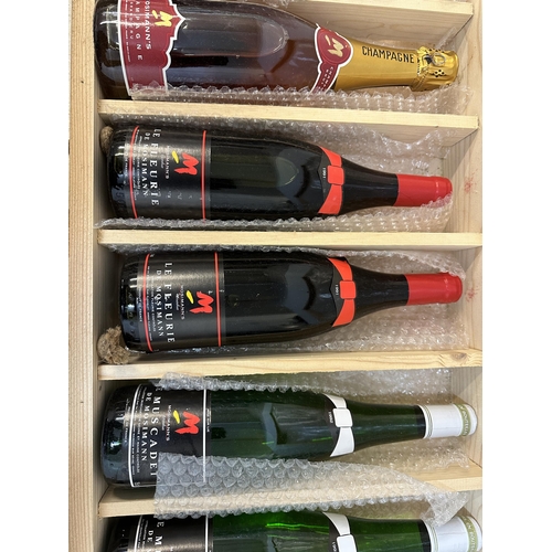 136 - A wooden case of six mixed bottles of De Mosimann to include Champagne, Le Fleurie, Muscadet Locatio... 