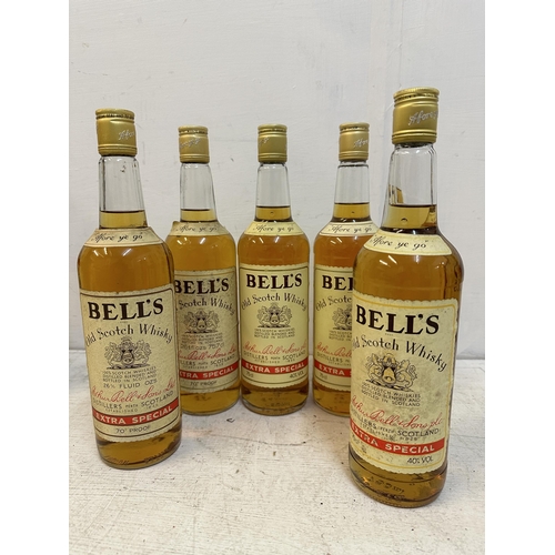 143 - Five bottles of Bells Old Scotch Whisky A/F, 3 x 75cl, 2 x 26 2.3 fl oz Location: fire door (wood bo... 