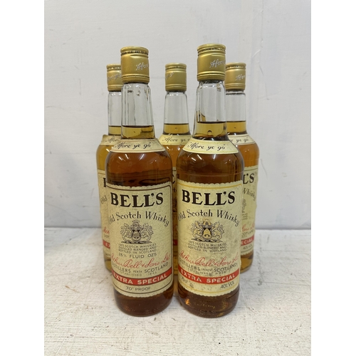 143 - Five bottles of Bells Old Scotch Whisky A/F, 3 x 75cl, 2 x 26 2.3 fl oz Location: fire door (wood bo... 