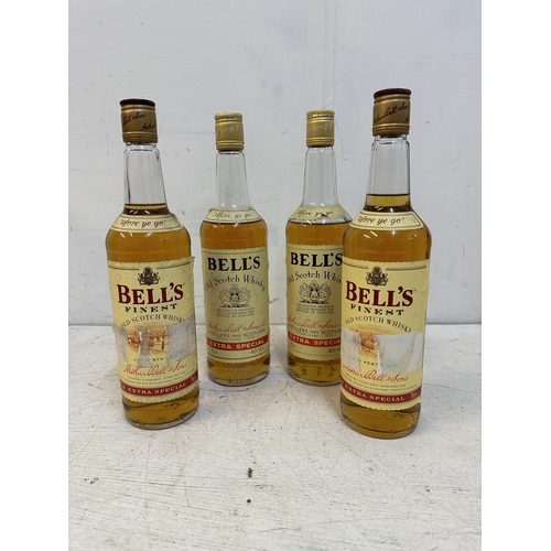 141 - Two bottles of Bells Old Scotch Whisky 75cl and two bottles of Bells Finest Old Scotch Whisky, 70cl ... 