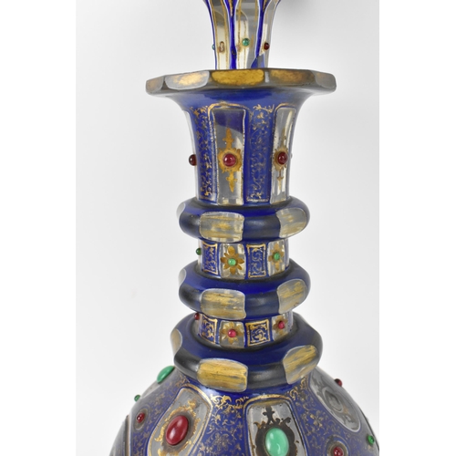 167 - A large 19th century bohemian flash overlay and jewelled cut glass decanter, in cobalt blue overlay ... 