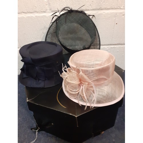 88 - A quantity of 13 modern ladies formal hats to include straw hats in various colours and styles toget... 