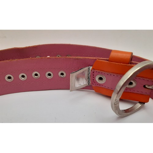 94 - Dolce & Gabbana-An orange and pink D&G belt with silver tone buckle
Condition: Slight areas of wear ... 