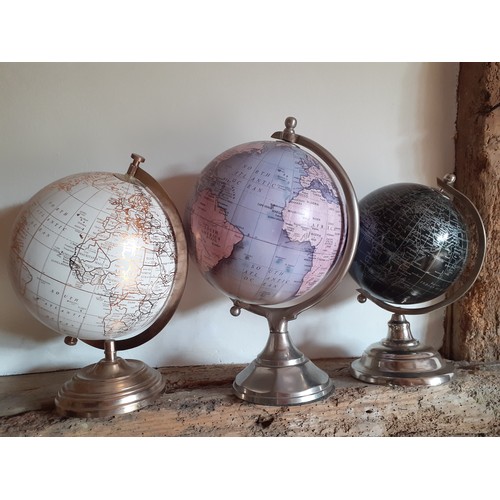 250 - Three Legend globes in various heights; 28cmH, 29cmH and 34cmH. Location:R1.1