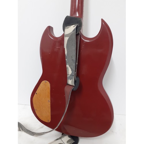 184 - A Gibson SG clone with an after-market replacement neck in red with a wooden pick guard together wit... 