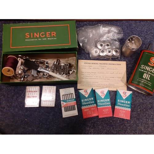 75 - A 1950's 99k electric Singer sewing machine serial number EG043144 with domed oak case and accessori... 