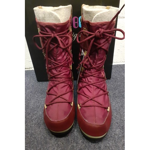 107 - A pair of waterproof/snow proof burgundy 'Monoco' Moonboots, unworn, new with original tags and box,... 