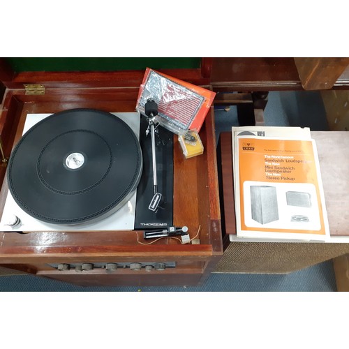 183 - A mid 20th Century Leak Stereo 30 Plus in a hardwood veneered cabinet with integrated Thorens turnta... 