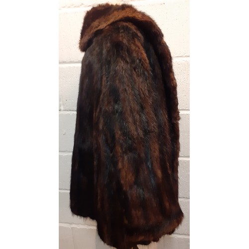 109 - A vintage sable fur jacket having a shawl collar and 2 front pockets and flared sleeves, 40