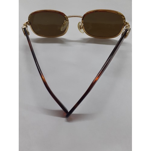 108 - Rochas-A pair of vintage gold tone sunglasses, model 90778 with green lenses and tortoiseshell effec... 