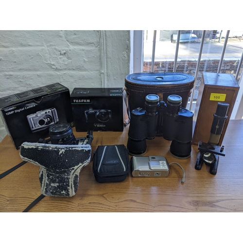 105 - A selection of cameras to include a Minolta xG2 film camera, digital camera, Regent 7 x 50 binocular... 