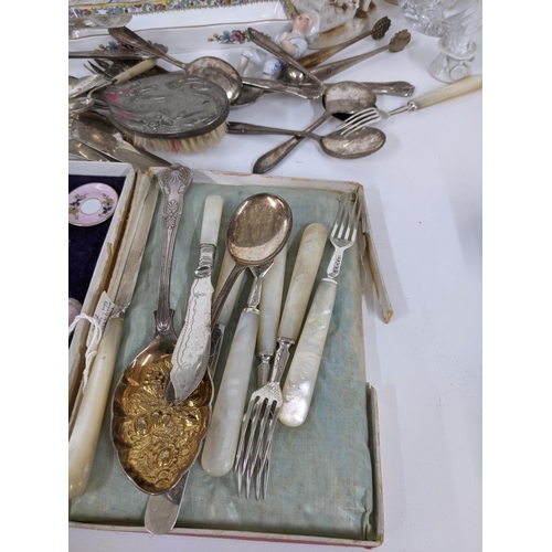 180 - A mixed lot to include early 20th century Japanese Kutani ware, Victorian miniature tea set, silver ... 