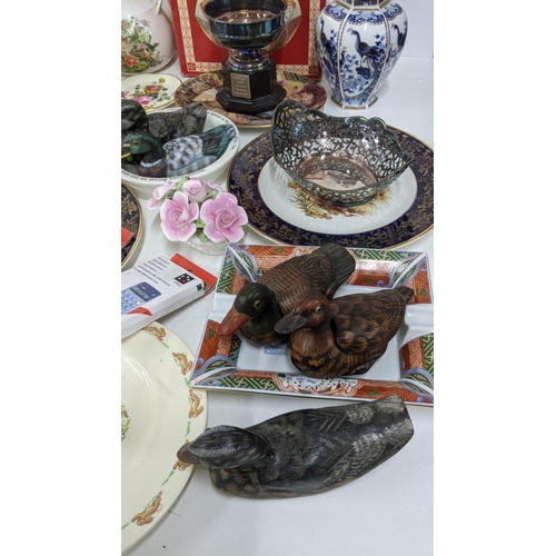 44 - A mixed lot to include wooden ducks, mixed silver plate to include a pierced oval shaped bowl, pewte... 