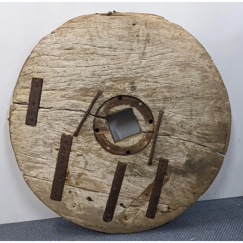 65 - An antique wall mounted wheel, possibly a Japanese ox cart wheel, 76cm diameter
Location:A4F