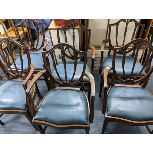 79 - Set of six mahogany shield back carved dining chairs with leather upholstered drop in seats, Locatio... 