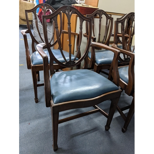 79 - Set of six mahogany shield back carved dining chairs with leather upholstered drop in seats, Locatio... 