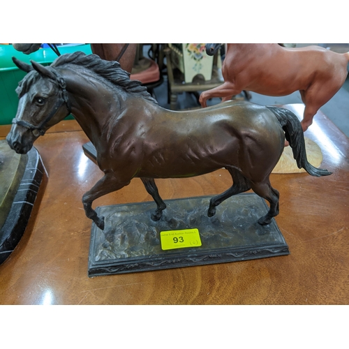 93 - A group of bronze, porcelain and resin horse and dog sculptures to include Dr Robert Taylor for Fran... 