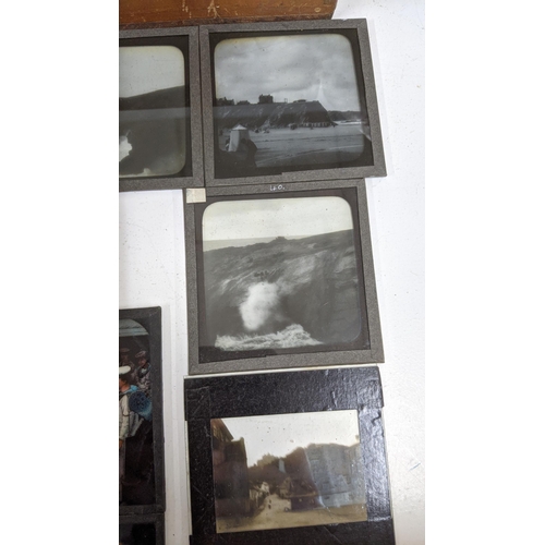 156 - A quantity of photographic slides in monochrome and colour depicting cartoons and photographic image... 