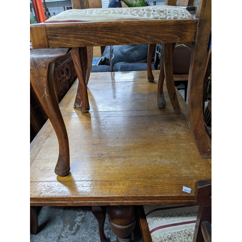 66 - An oak extending dining table, on turned supports and splayed feet, 75 x 106 x 75.5cm (167cm when ex... 