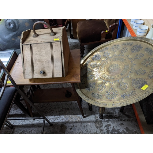 69 - An Edwardian mahogany two tier occasional table, a middle Eastern brass topped table, the inlaid woo... 