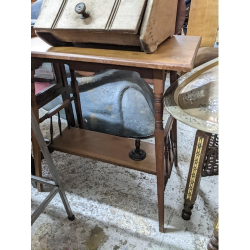 69 - An Edwardian mahogany two tier occasional table, a middle Eastern brass topped table, the inlaid woo... 