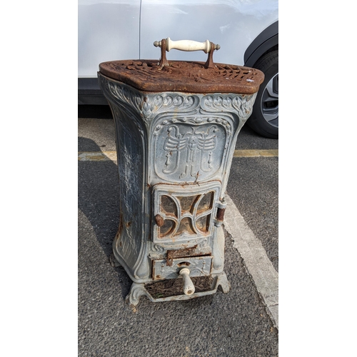 An early 20th century French La Salamandre cast iron wood burning stove ...