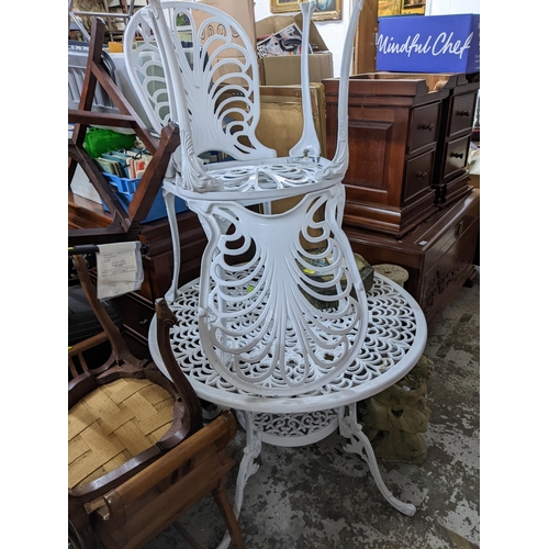 74 - A white painted metal garden table and four garden chairs, Location:G