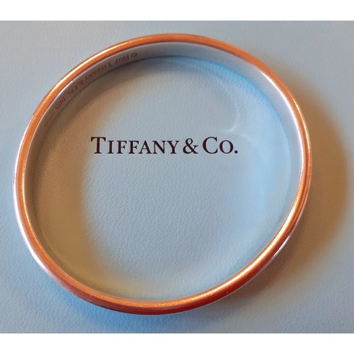 16 - Tiffany & Co- A 1997 Tiffany Sterling silver '1837 Collection' concave bangle 33.6g, stamped 925 and... 