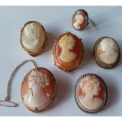 126 - Four cameo style brooches to include one in a rolled gold mount, a cameo style clip and a cameo styl... 